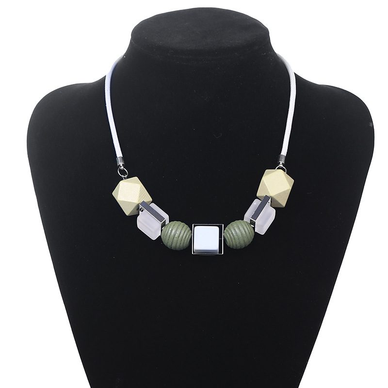 1636797220220 Discover the beauty of the pendant necklace made of unique colored woods.